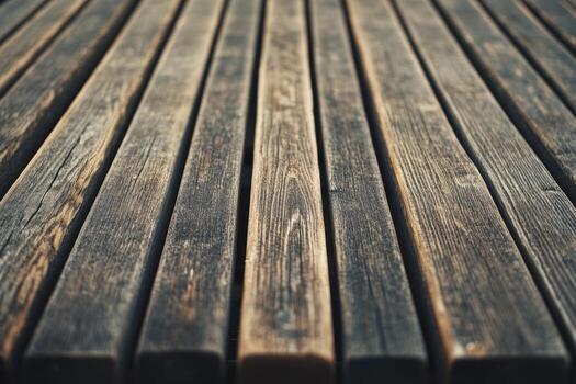 Wooden planks arranged in parallel lines on a rustic surface photo