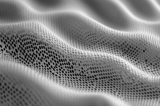 Abstract texture of mesh fabric undulating softly under light photo