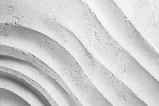 Curved white architectural design featuring textured layered patterns photo