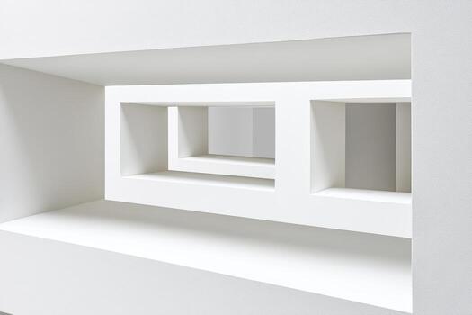 Geometric white architectural structure with rectangular openings photo