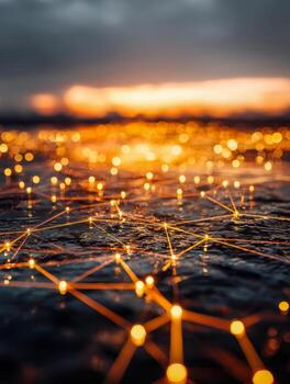 Glowing interconnected nodes on dark surface with a warm sunset background illustrating digital networking and futuristic technology concepts in soft focus photo