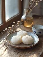 Cozy Morning Delight Sweet Mochi and Warm Tea by the Window photo