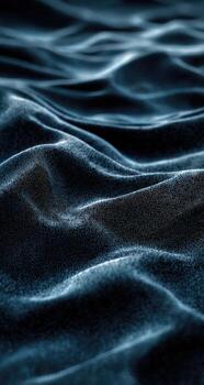 A close up of a black fabric with waves photo