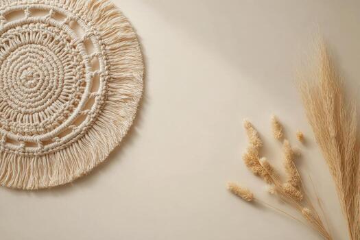 A white wall with a circular macrame on it photo