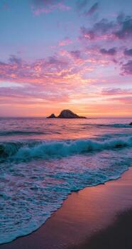 A sunset over the ocean with waves and a small island in the background photo