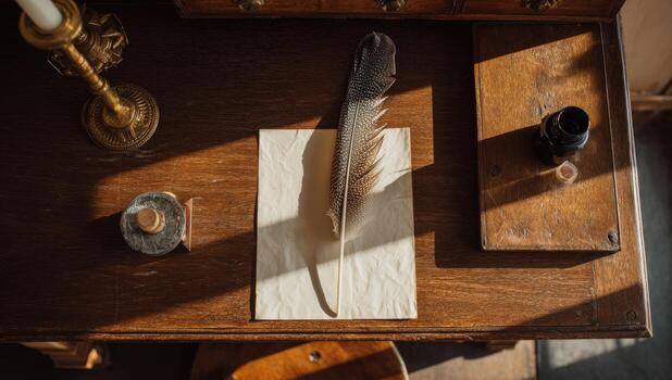 An old desk with a quill and inkwell on it photo