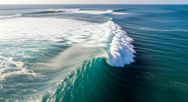 Aerial View Of Ocean Waves Crashing On Coastal Rocks photo