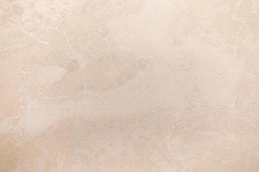 Abstract marble texture with subtle patterns in a light beige hue creating a serene backdrop for various design projects photo