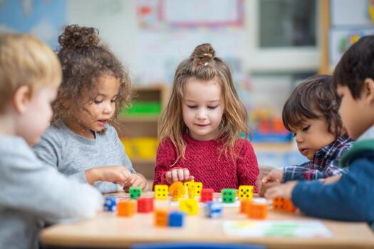 cinco joven niños son sentado alrededor un mesa enfocado en edificio con vibrante bloques el ajuste es un animado salón de clases lleno con educativo materiales y juguetes foto