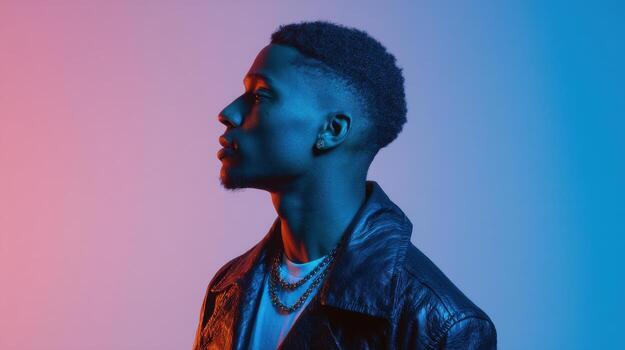 Profile Portrait Of A Man In Dramatic Lighting With Blue And Pink Hues. Artistic Expression Through Contrasting Colors photo