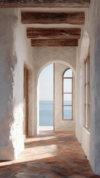 Mediterranean-Style Hallway With Ocean View Through Arched Windows. Serene Coastal Architecture And Rustic Charm photo