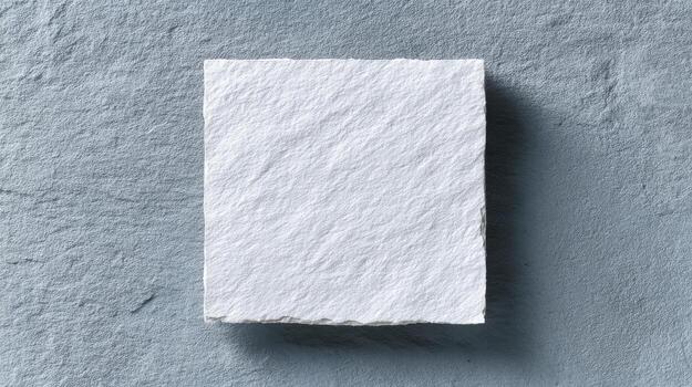 Textured White Paper On Gray Surface. Minimalist Design And Creative Background photo