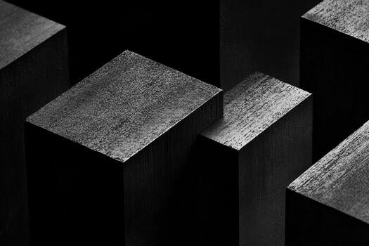 Abstract composition of black geometric shapes in a dark setting photo