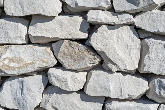 Natural stone wall showcasing unique textures and patterns in sunlight photo