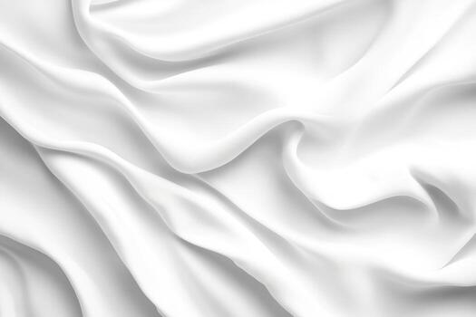Soft white fabric draping elegantly with smooth, flowing folds and curves photo