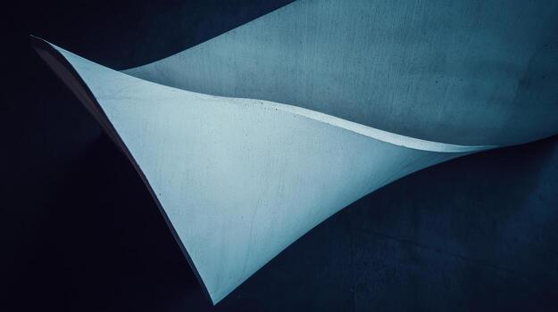 Curved paper sheet creating an intriguing visual effect in a dark setting photo