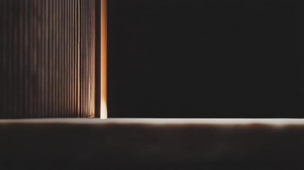 Light peeking through a crack in a dark room creating a serene atmosphere photo