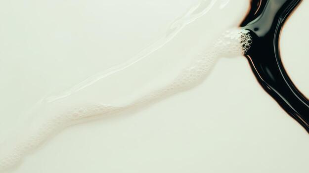 Liquid interaction on a smooth surface creates interesting patterns and textures photo