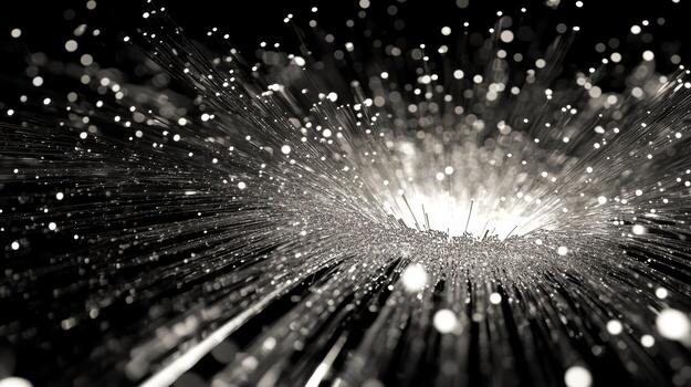 Dynamic burst of light in a dark background with shimmering particles photo