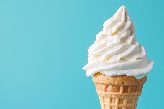 Ice cream cone on blue background photo