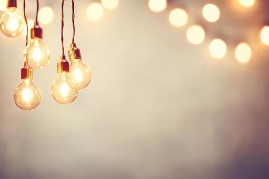 A string of light bulbs hanging from a wall photo