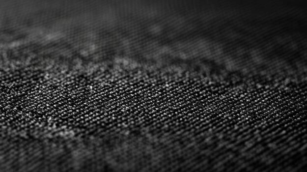Textured black fabric surface with a modern appearance and depth photo