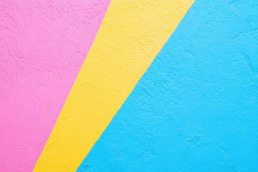 Colorful geometric patterns on a wall create a vibrant urban scene photo