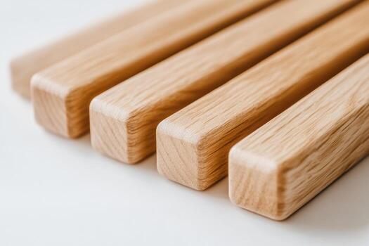 Close look at wooden blocks arranged neatly on a white surface photo