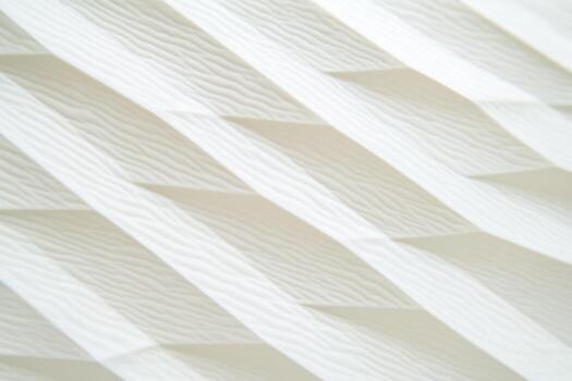Detailed close-up of textured white paper with wavy patterns photo