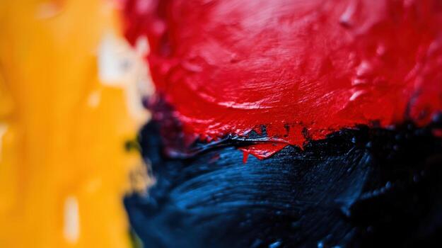 Bold colors blend in an abstract painting during a creative session photo