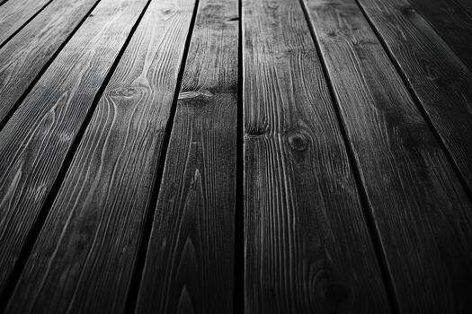 Dark wooden floor with visible grain patterns and texture in natural light photo