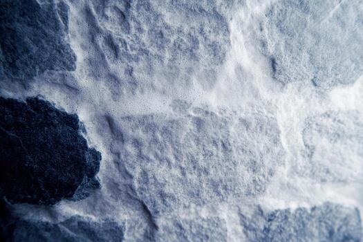 de cerca ver de texturizado Roca pared con variar sombras de gris foto
