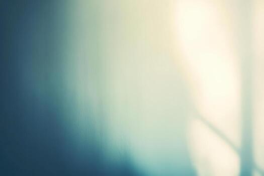 Soft light creates abstract shapes on a wall in a quiet room setting photo