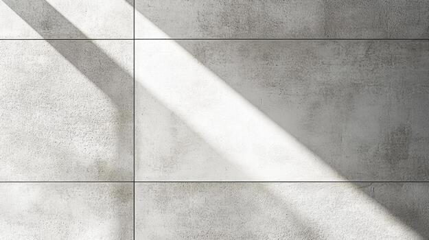 Concrete wall with shadows creating abstract patterns in daylight photo
