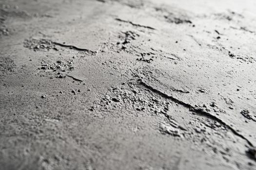 Textured concrete surface showing unique details and patterns in natural light photo