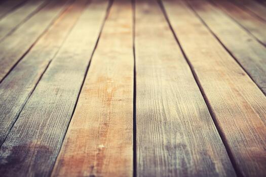 Wooden floor with natural textures and patterns in warm lighting photo