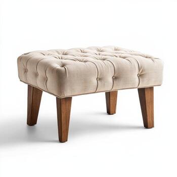 A small foot stool with a buttoned up top photo