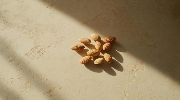 Almonds on a wall with sunlight photo