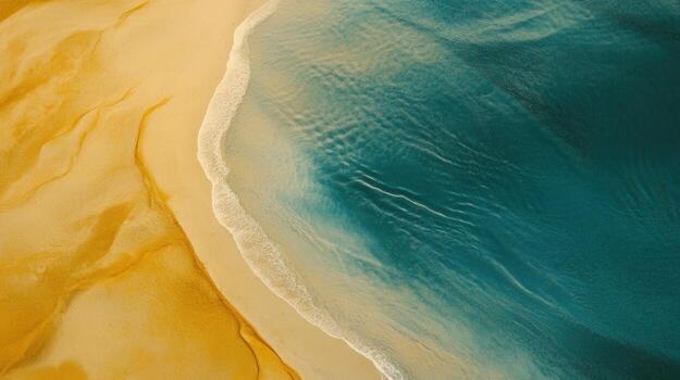 Aerial view of the ocean and sand photo