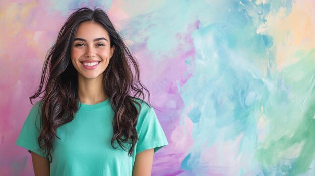 A woman smiling in front of a colorful wall photo