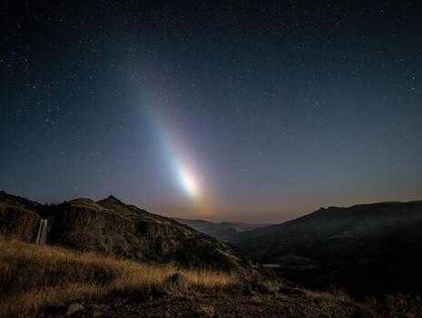 A Rare And Mystical Moonbow Appearing In The Darkness photo