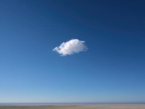 The Vast Desert Sky With Only A Single Cloud photo