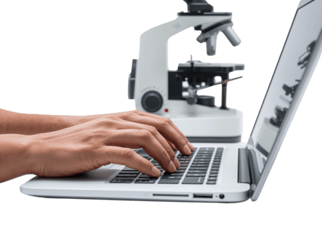 Hands typing on laptop with microscope on isolated transparent display, modern research tool usage png