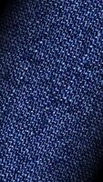 premio tattile sensazione di denim tessuto nel continuo rotazione, presentazione raffinato elegante lussuoso sfondo entro esclusivo design struttura video