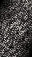 Premium refined rotation of gray jean fabric with elegant structured surface, presenting luxurious exclusive tactile depth in a design backdrop video