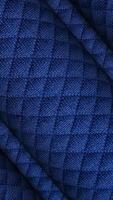 blu cotone tessuto mutevole nel continuo struttura rotazione, creato per sartoria studi e innovativo moderno design progetti video