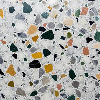 Stylish terrazzo polished abstract pattern background top view with colorful stone chips photo
