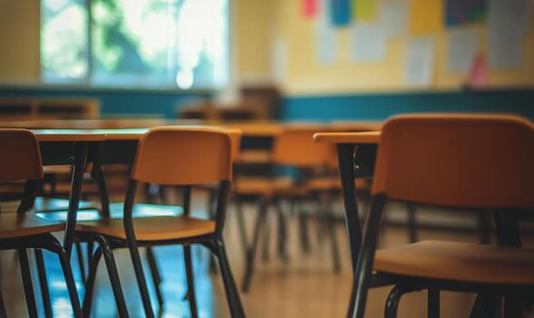Classroom Environment With Empty Desks and Chairs in the Late Afternoon. photo