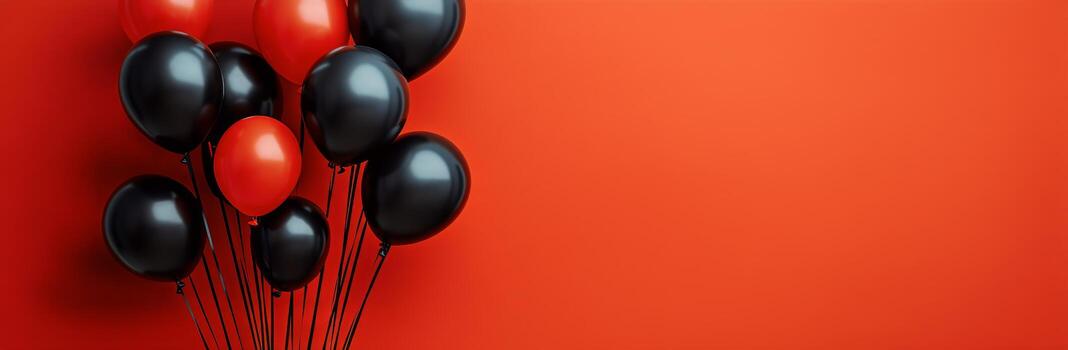Bunch of Red and Black Balloons on a Solid Red Background for Graphic Usage photo