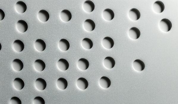 Close-up of a White Surface With Recessed Circles Forming the Braille Alphabet. photo